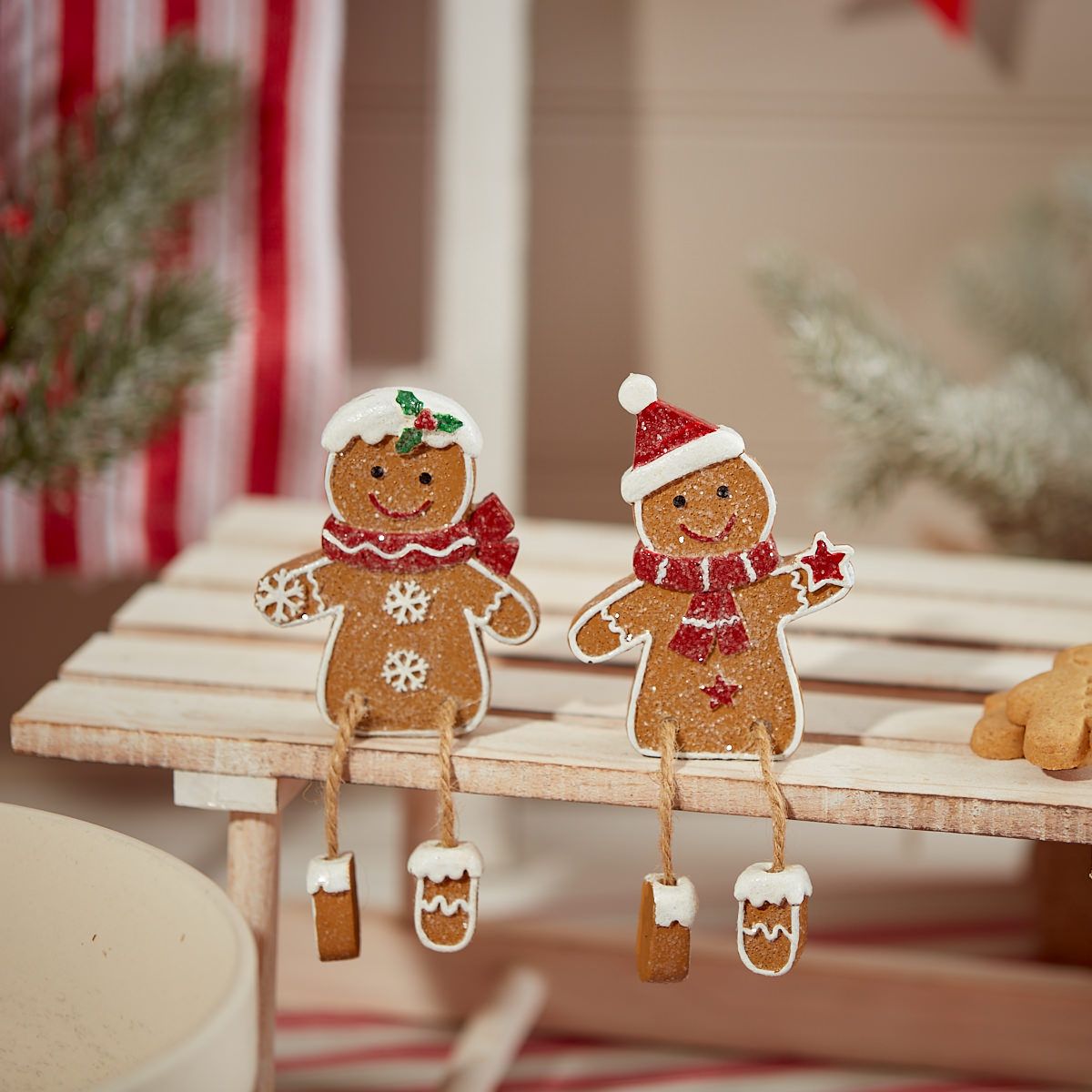 Gingerbread shelf sitting ornament with dangly legs