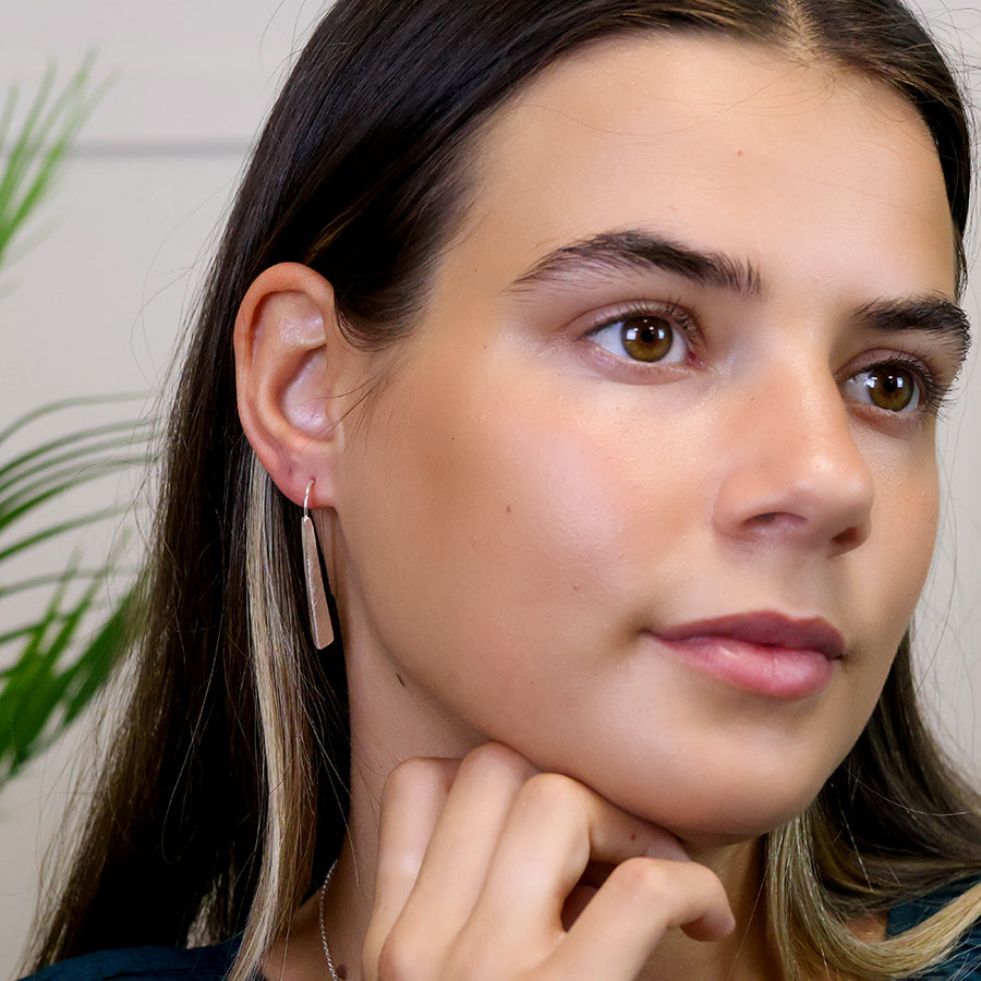Golden brushed tri-edge drop earrings