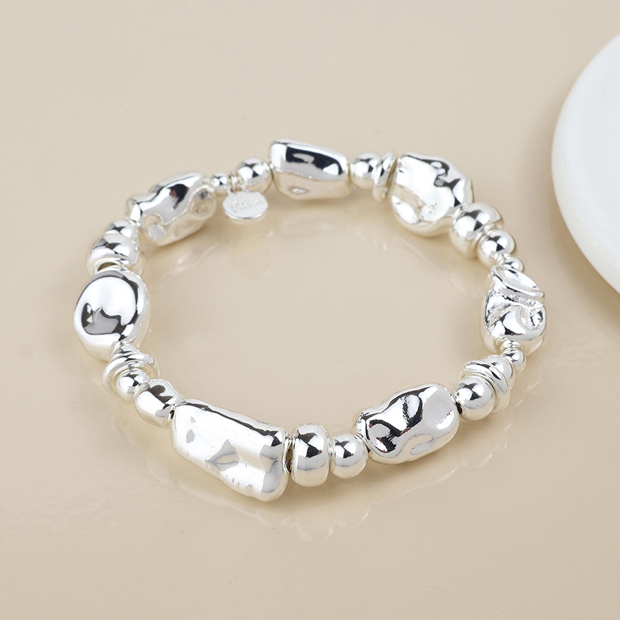 Silver plated mixed organic bead bracelet
