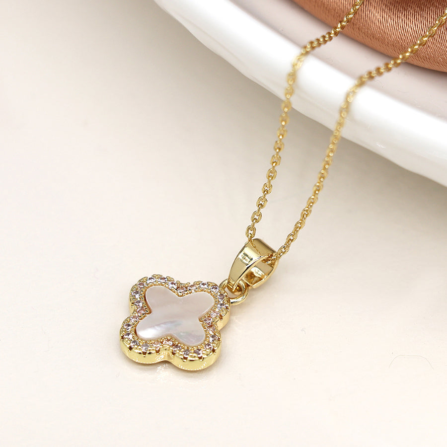 Golden crystal edged quatrefoil necklace