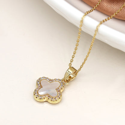 Golden crystal edged quatrefoil necklace
