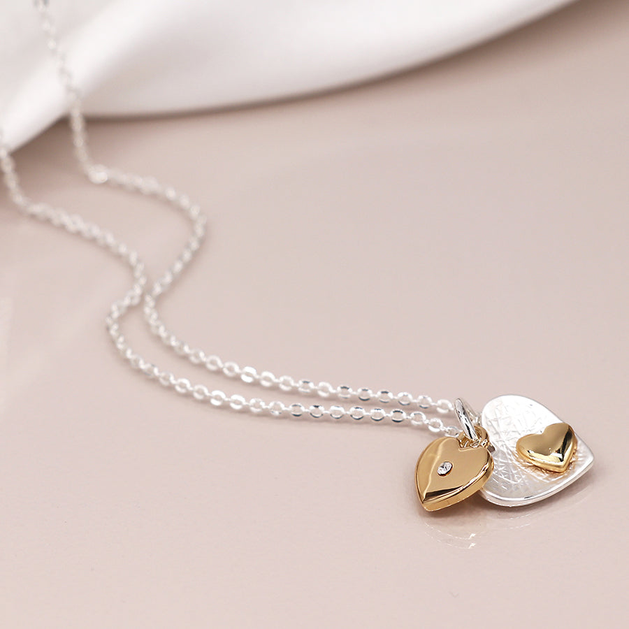 Silver and gold plated double heart necklace