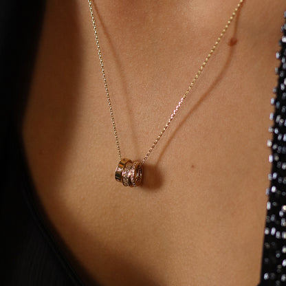 Gold plated triple mini crystal rings necklace