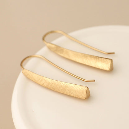Golden brushed tri-edge drop earrings