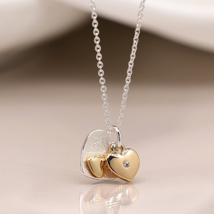 Silver and gold plated double heart necklace