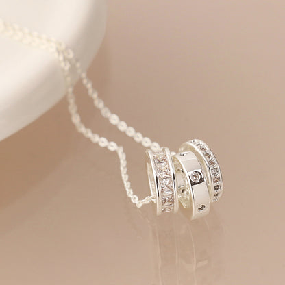 Silver plated triple mini crystal rings necklace
