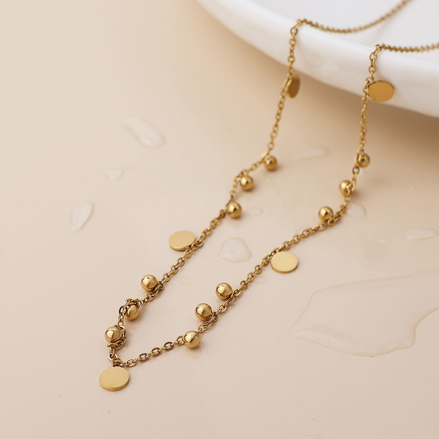 Waterproof gold plated bead and disc charm necklace