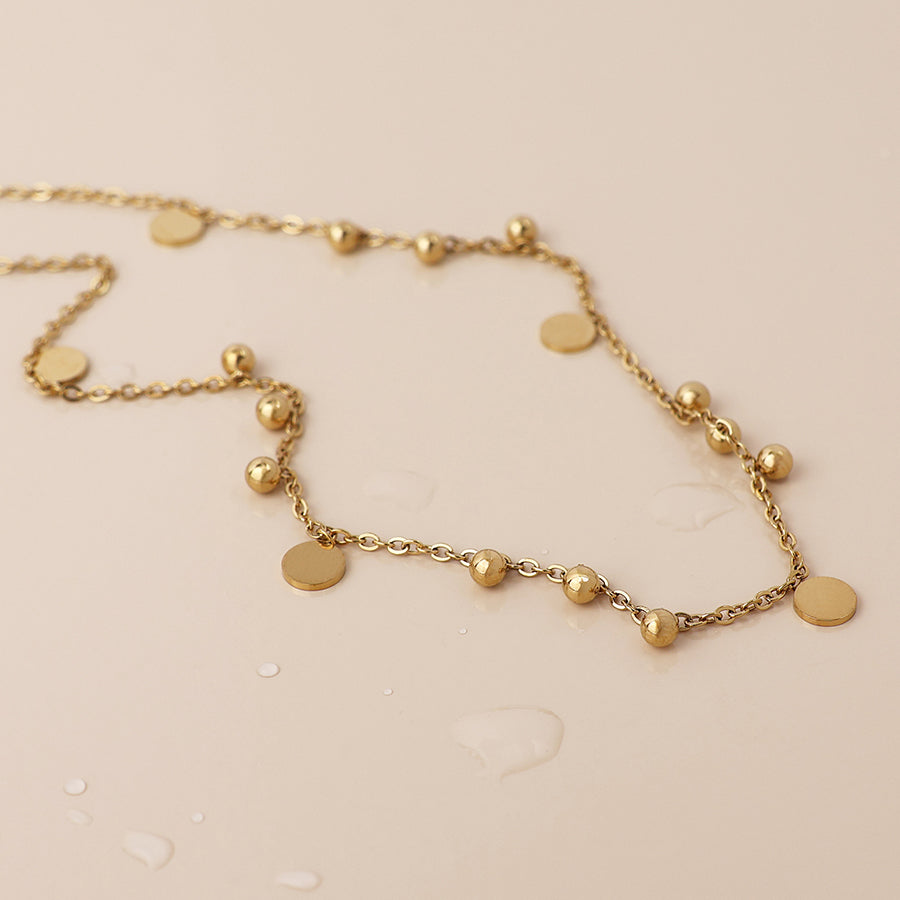 Waterproof gold plated bead and disc charm necklace