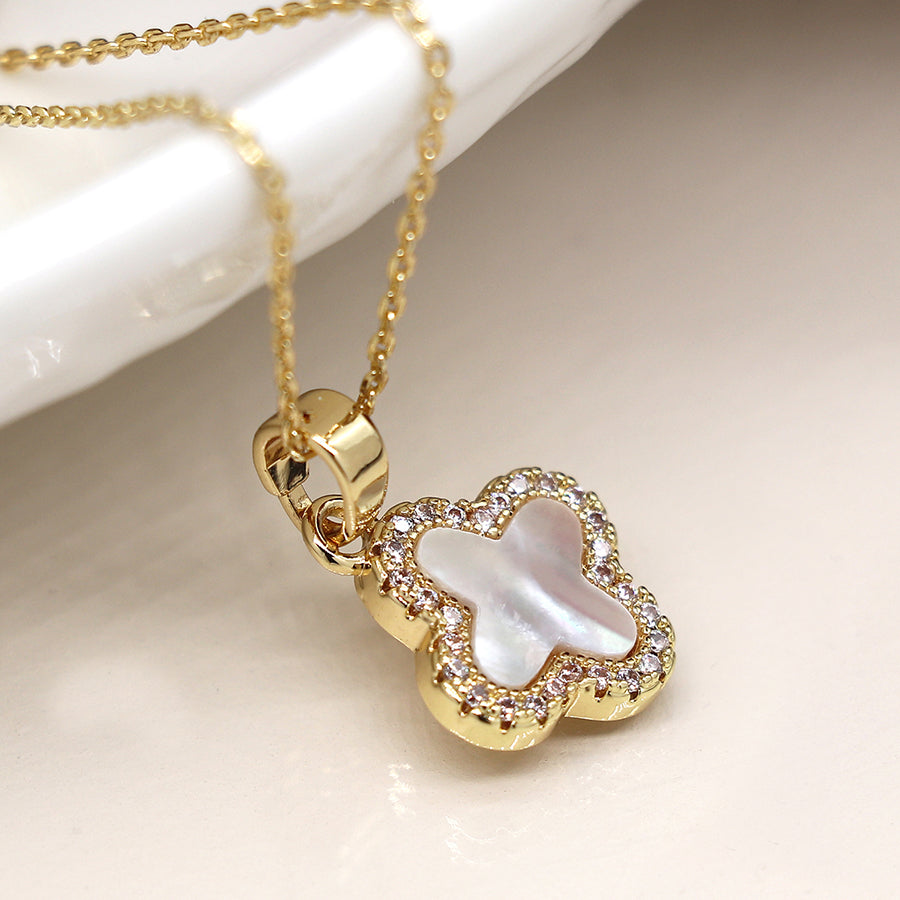 Golden crystal edged quatrefoil necklace