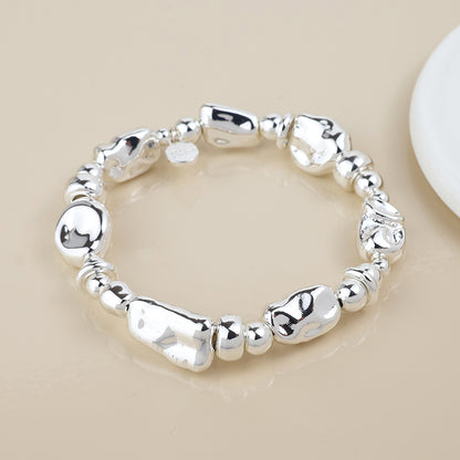 Silver plated mixed organic bead bracelet