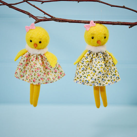 Hanging chick in floral dress