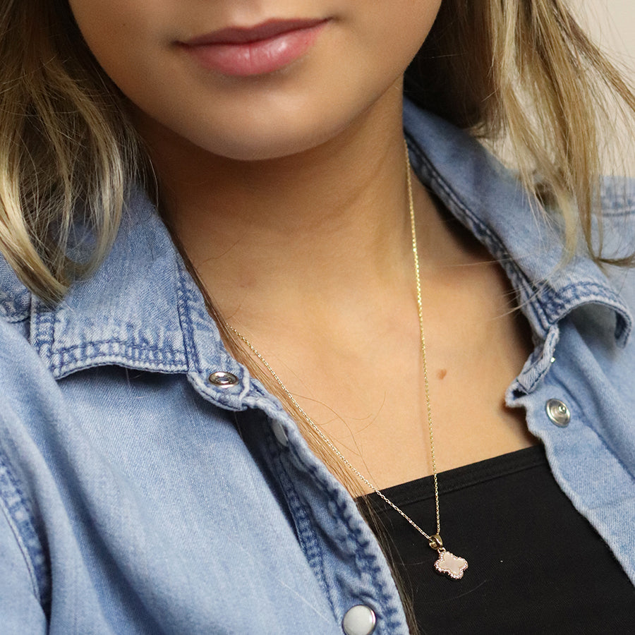 Golden crystal edged quatrefoil necklace