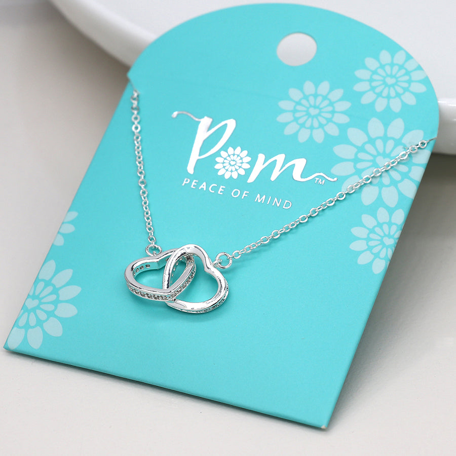 Silver plated crystal edged linked hearts necklace