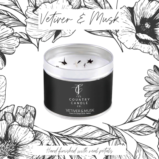 The country candle co vetivert + musk tin candle
